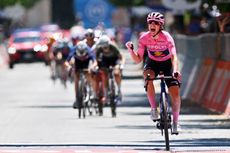 Elisa Longo Borghini crosses the line to confirm overall victory at the 2024 Giro d'Italia Women