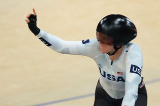 US' Jennifer Valente celebrates winning the women's track cycling omnium event of the Paris 2024 Olympic Games at the Saint-Quentin-en-Yvelines National Velodrome in Montigny-le-Bretonneux, south-west of Paris, on August 11, 2024. (Photo by Emmanuel DUNAND / AFP)