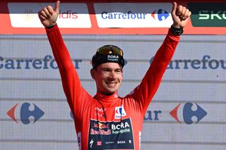 ALTO DE MONCALVILLO SPAIN SEPTEMBER 06 Primoz Roglic of Slovenia and Team Red Bull Bora hansgrohe celebrates at podium as Red Leader Jersey winner during the La Vuelta 79th Tour of Spain 2024 Stage 19 a 1735km stage from Logrono to Alto de Moncalvillo 1490m UCIWT on September 06 2024 in Alto de Moncalvillo Spain Photo by Tim de WaeleGetty Images